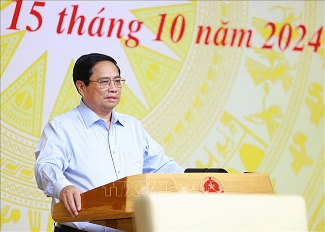 Thủ tướng Chính phủ Phạm Minh Chính yêu cầu phải giảm thủ tục hành chính, phân quyền mạnh hơn. Ảnh: TTXVN