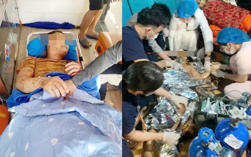 Hai cha con ông Đ.B.Đ. được đưa lên bờ. 