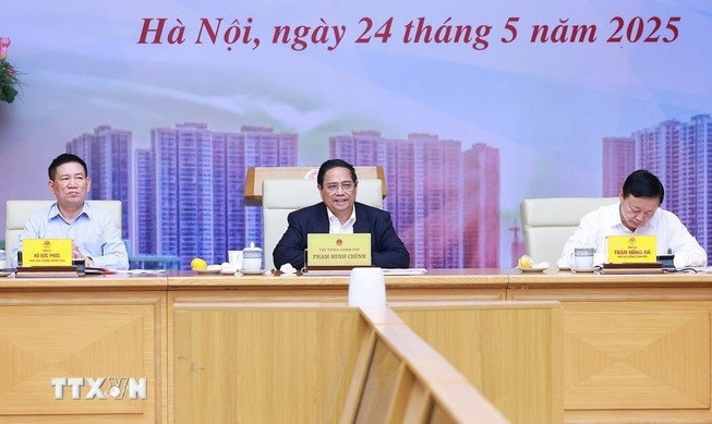 Thủ tướng Phạm Minh Chính chủ trì cuộc làm việc về tình hình thị trường vàng. (Ảnh: Dương Giang/TTXVN) Thủ tướng Phạm Minh Chính chủ trì cuộc làm việc về tình hình thị trường vàng. (Ảnh: Dương Giang/TTXVN)