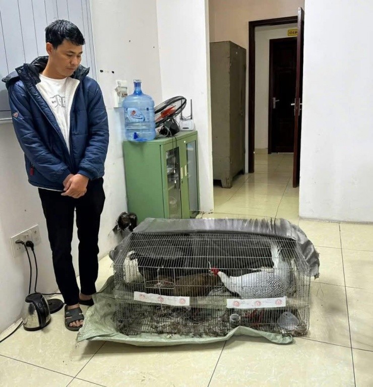 Anh Thành thời điểm bị công an bắt giữ cùng tang vật.