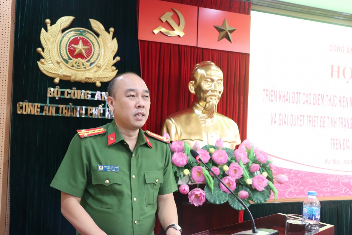 Đại tá Nguyễn Đức Long, Phó Giám đốc CATP phát biểu kết luận Hội nghị. (Ảnh: CAHN)