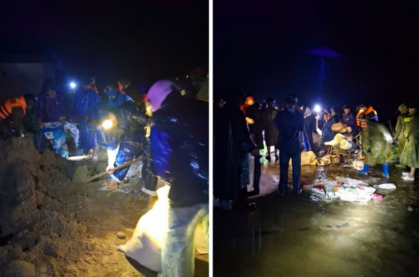 Các chiến sĩ công an hỗ trợ đắp đê cùng nhân dân.