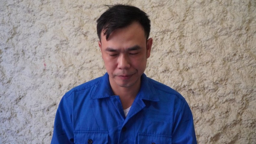 Đối tượng Nguyễn Mạnh Tuân tại cơ quan công an. Ảnh: CACC