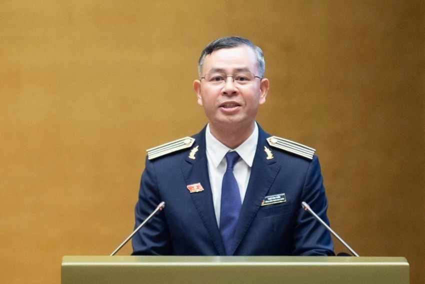 Tổng Kiểm toán Nhà nước Ngô Văn Tuấn trình bày báo cáo. Ảnh: Quốc hội Tổng Kiểm toán Nhà nước Ngô Văn Tuấn trình bày báo cáo. Ảnh: Quốc hội