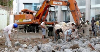 Áp dụng quy định nào để cưỡng chế phá dỡ công trình xây dựng vi phạm?