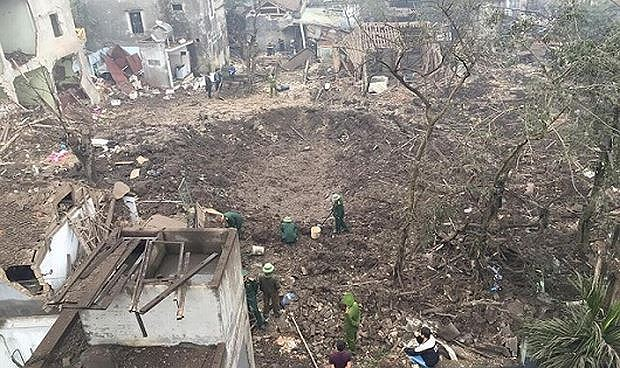 Hi&ecirc;̣n trường vụ n&ocirc;̉ ở làng ph&ecirc;́ li&ecirc;̣u Quan Đ&ocirc;̣, Bắc Ninh.