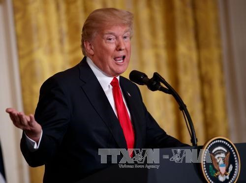 Tổng thống Donald Trump kỷ niệm năm cầm quyền đầu ti&ecirc;n trong bối cảnh ch&iacute;nh phủ cạn kiệt ng&acirc;n s&aacute;ch. Ảnh: THX/TTXVN