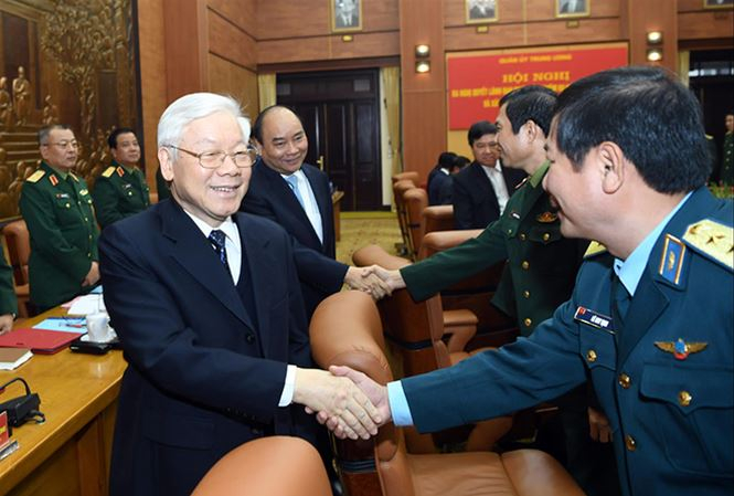 Tổng B&iacute; thư, Chủ tịch nước Nguyễn Ph&uacute; Trọng, Thủ tướng Nguyễn Xu&acirc;n Ph&uacute;c v&agrave; c&aacute;c đại biểu dự hội nghị. ẢNH: CTV