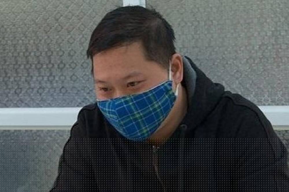 ượng Bùi Văn Định tại cơ quan công an sau 10 năm trốn truy nã. Ảnh: Zing