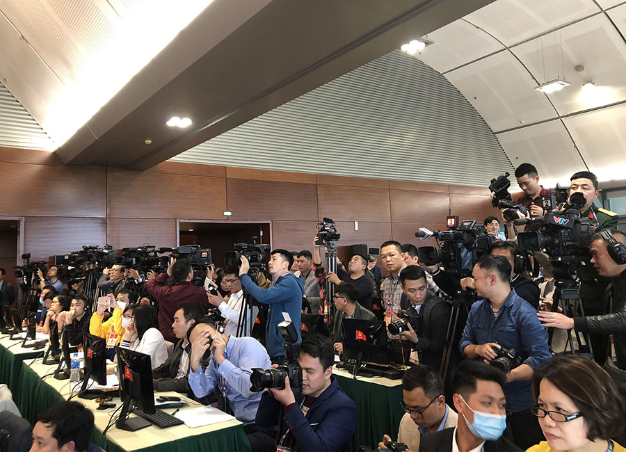 Các phóng viên tác nghiệp tại lễ Khai trương Trung tâm Báo chí.