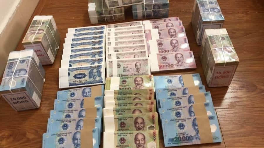 Đổi tiền lẻ mừng tuổi dịp Tết: Đổi ở đ&acirc;u hợp ph&aacute;p? (H&igrave;nh ảnh minh hoạ)