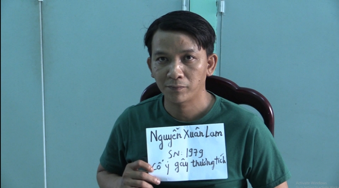 Đối tượng truy n&atilde; Nguyễn Xu&acirc;n Lam tại cơ quan c&ocirc;ng an.