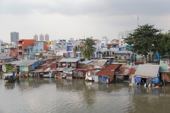 TPHCM c&ograve;n 20.000 căn nh&agrave; tr&ecirc;n v&agrave; ven k&ecirc;nh, rạch cần phải tiếp tục di dời. Ảnh: M.Q