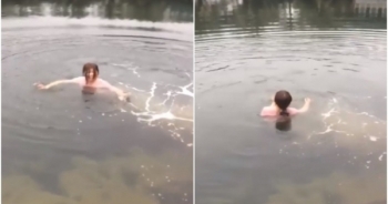 Clip: Giữa thời tiết 6 độ C, cô gái nhảy xuống hồ chỉ để lấy 50 nghìn cá cược của bạn bè khiến nhiều người bất bình