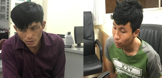 Hai nghi can Nguyễn Vũ Ho&agrave;ng Nam (b&ecirc;n tr&aacute;i) v&agrave; Trần Tuấn Anh tại cơ quan c&ocirc;ng an.
