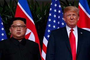 Tổng thống Mỹ Donald Trump v&agrave; Chủ tịch Triều Ti&ecirc;n Kim Jong-un.
