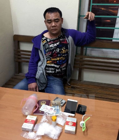 Đối tượng Huang Xian Hua.