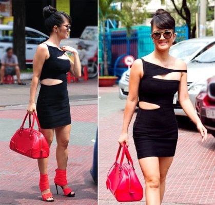 C&oacute; vẻ như thời tiết qu&aacute; n&oacute;ng nực, n&ecirc;n Diva Hồng Nhung đ&atilde; phải tự m&igrave;nh