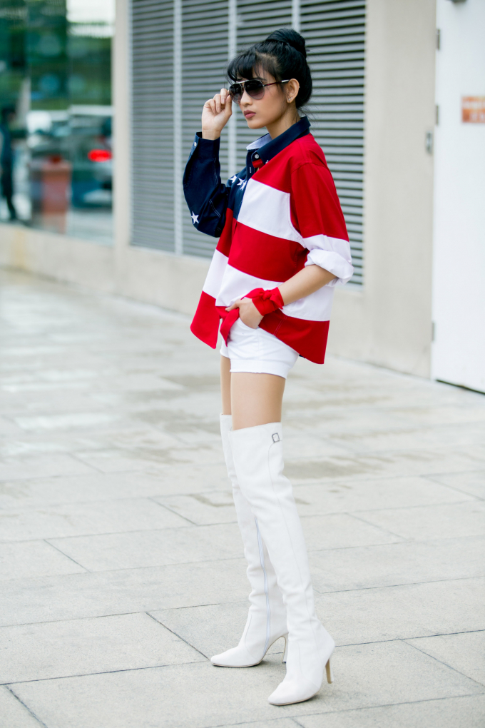 &Aacute; hậu Trương Thị May khoe ch&acirc;n d&agrave;i mi&ecirc;n man khi dạo phố