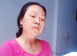 B&agrave; Thu l&uacute;c bị mời l&ecirc;n c&ocirc;ng an l&agrave;m việc. Ảnh:&nbsp;Trần Duy.