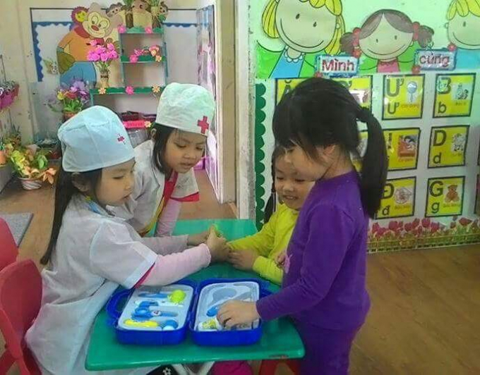 Gi&aacute;o vi&ecirc;n mầm non phải thực sự y&ecirc;u nghề, mến trẻ. Ảnh: Cao Thu Thủy