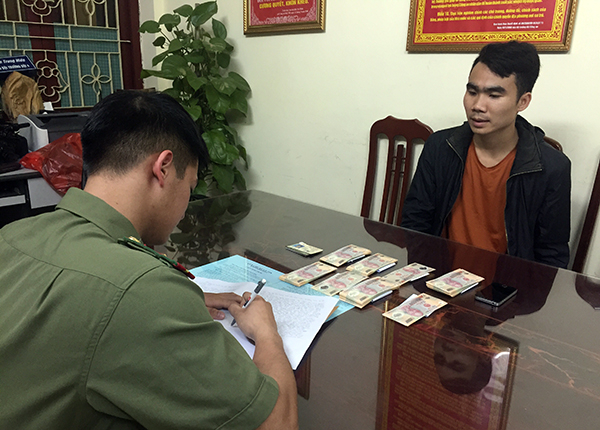 Đối tượng N&ocirc;ng Quốc Ho&agrave;ng tại cơ quan c&ocirc;ng an.