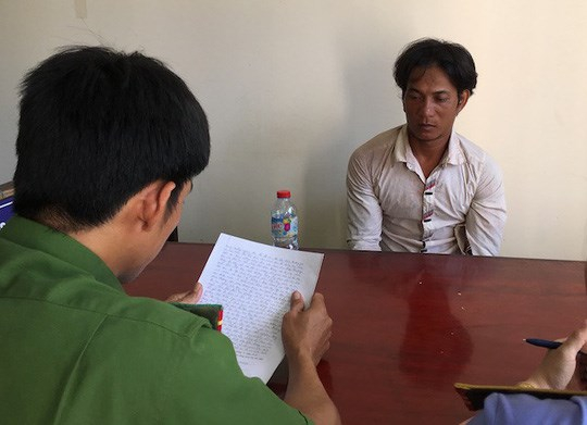 Phạm Văn Tuấn tại cơ quan điều tra. (Ảnh: b&aacute;o An ninh tiền tệ)