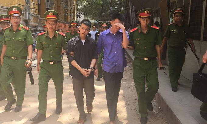 Bị c&aacute;o Nh&acirc;n v&agrave; Quang. Ảnh VNN