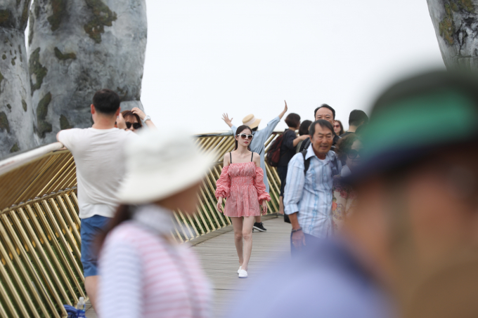 Sự xuất hiện của Cầu V&agrave;ng th&aacute;ng 6/2018 đ&atilde; g&oacute;p phần kh&ocirc;ng nhỏ đưa Đ&agrave; Nẵng trở th&agrave;nh &ldquo;điểm phải đến tr&ecirc;n thế giới năm 2018, 2019&rdquo;.