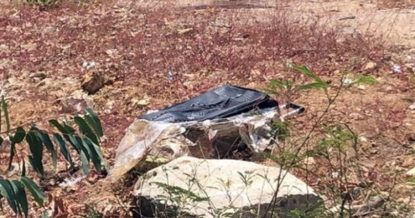 Phát hiện thi thể đang phân hủy trong vali bên đường