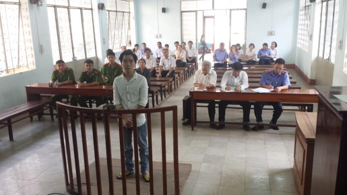 Bị c&aacute;o Đỗ Kim Tiểu Phi tại t&ograve;a.