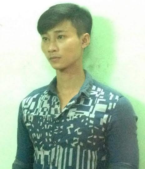 Đối tượng Trần Đ&ocirc;ng Quốc tại cơ quan C&ocirc;ng an.