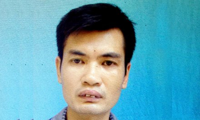 Ch&acirc;n dung nghi phạm Nguyễn Mạnh H&ugrave;ng người đ&atilde; cầm dao đ&acirc;m B&iacute; thư thị trấn Kỳ Sơn.