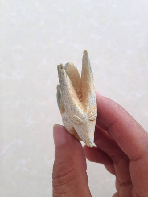 Trang sức c&oacute; h&igrave;nh giống đầu Tr&acirc;u hoặc D&ecirc;. (Ảnh: Ng&ocirc; Ho&agrave;ng Long)