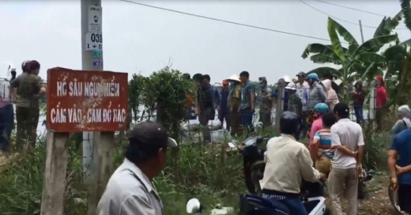 Phát hiện thi thể nam dân quân tự vệ dưới hồ đá ở Bình Dương