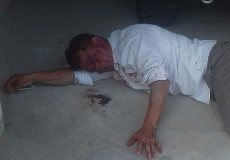 H&igrave;nh ảnh &ocirc;ng H&ograve;a bị đ&aacute;nh gục tại c&ocirc;ng ty Bảo Kh&aacute;nh.