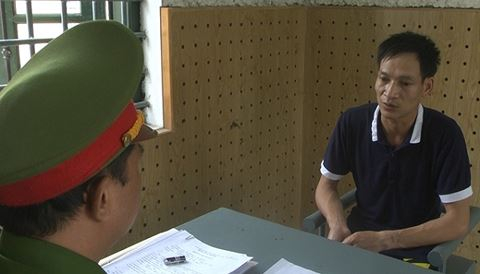 Đối tượng Trần Quang Đ&ocirc;ng tại cơ quan c&ocirc;ng an.