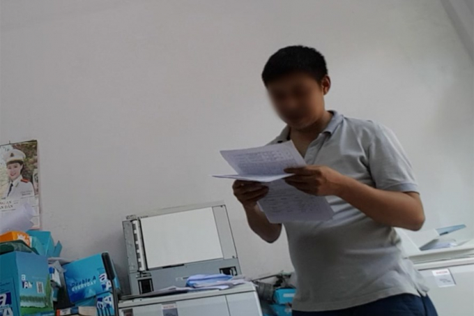 Chủ qu&aacute;n photo tr&ecirc;n đường Trần Quốc Ho&agrave;n, Cầu Giấy, H&agrave; Nội.