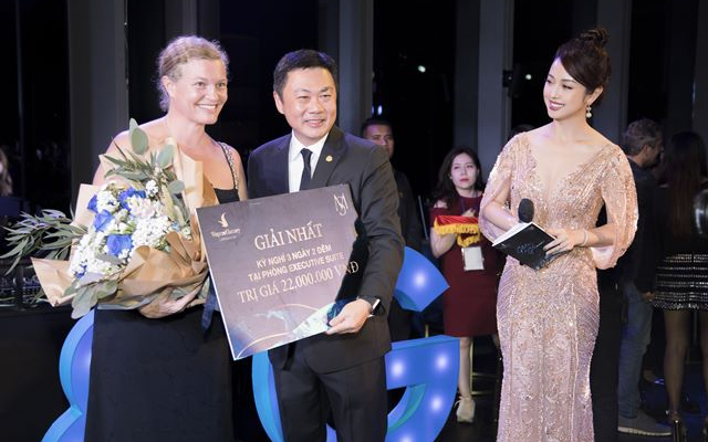 Jennifer Phạm kh&eacute;o l&eacute;o che vết thương khi trở lại l&agrave;m MC