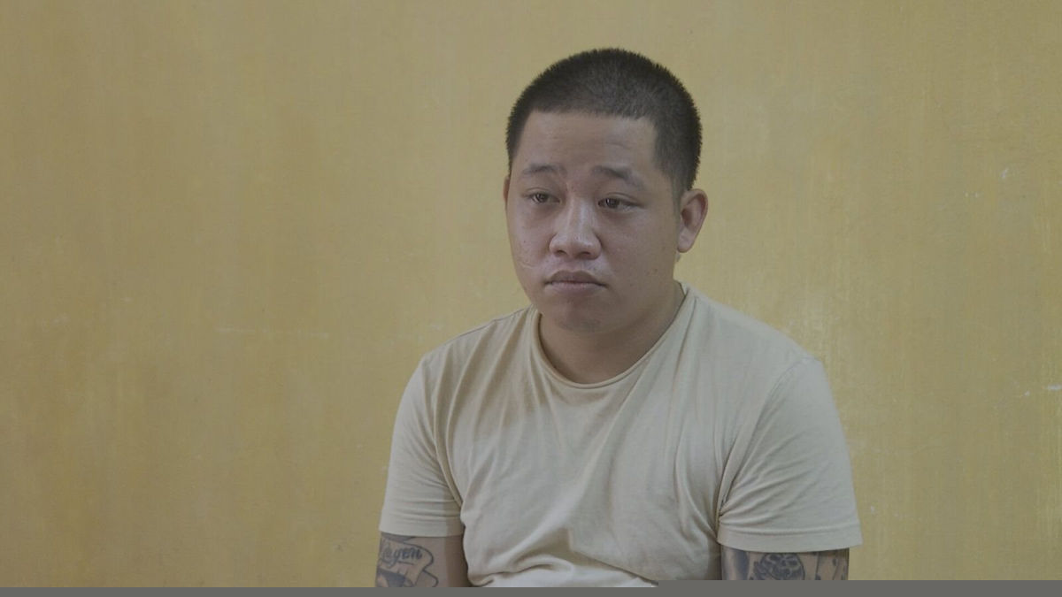 Nguyễn Minh Lưu tại cơ quan công an.