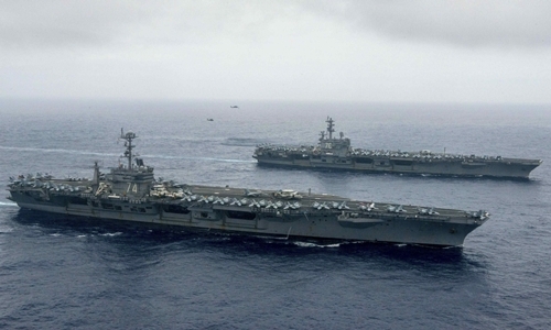 T&agrave;u s&acirc;n bay John C. Stennis v&agrave; Ronald Reagan hoạt động c&ugrave;ng nhau tại biển Philippines ng&agrave;y 18/6. (Ảnh:&nbsp;Reuters)