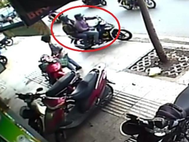 C&aacute;c đối tượng nghi vấn đi xe m&aacute;y được khoanh v&ograve;ng tr&ograve;n đỏ.