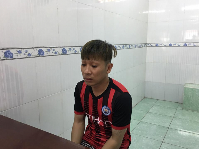 Huỳnh Ngọc Quốc tại cơ quan c&ocirc;ng an.