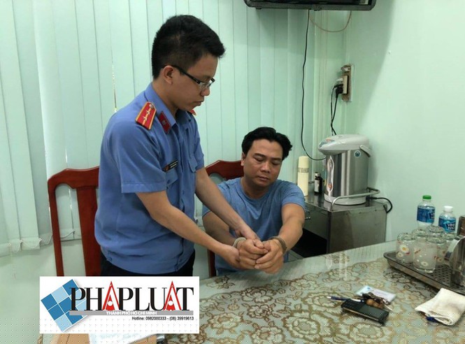 Đại úy công an bị khởi tố vì cho phạm nhân thuê điện thoại - ảnh 3
