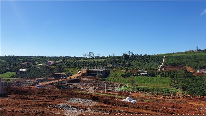 Một dự án bất động sản được phân lô, hoàn thiện hạ tầng giao thông, đường điện để mời chào khách đến mua. Ảnh: TTXVN phát