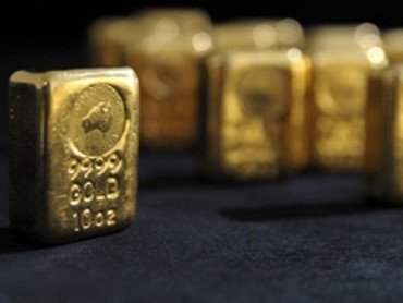 Gi&aacute; v&agrave;ng giảm gần 2% khi chứng kho&aacute;n tăng điểm