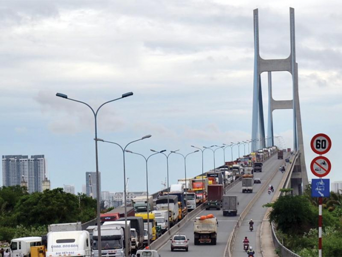 Phải mất 3 năm, Dự &aacute;n BOT cầu Ph&uacute; Mỹ mới ho&agrave;n th&agrave;nh hồ sơ quyết to&aacute;n c&ocirc;ng tr&igrave;nh. Ảnh: L&ecirc; To&agrave;n.