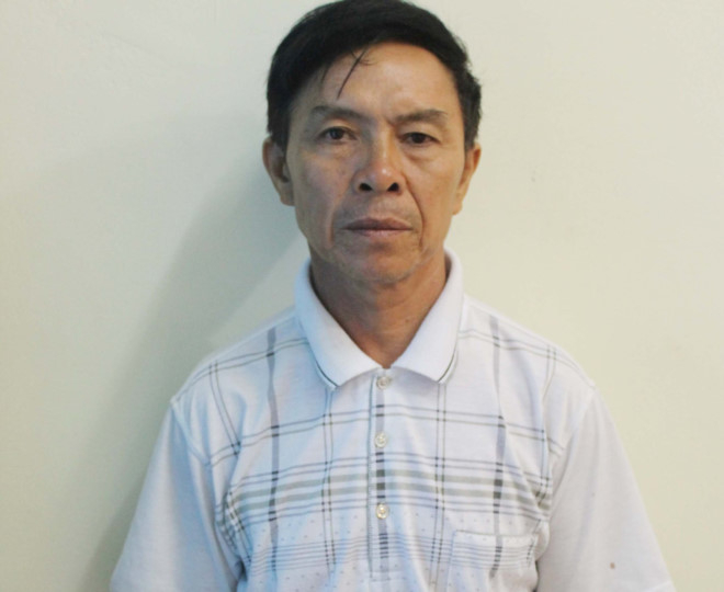 Nghi phạm Nguyễn Hữu Sơn tại cơ quan c&ocirc;ng an.