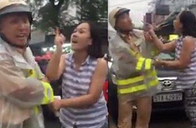 Trường hợp CSGT bị x&uacute;c phạm, h&agrave;nh hung tại phường 25, quận B&igrave;nh Thạnh, TPHCM. Ảnh cắt từ clip.