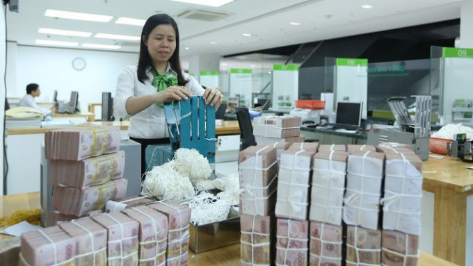 Theo Tổng cục Thống k&ecirc;, t&iacute;nh đến 20/6, tổng phương tiện thanh to&aacute;n đ&atilde; tăng 7,96% so với cuối năm 2017, cao hơn hẳn so với c&ugrave;ng kỳ năm trước (tăng 5,69%) - Ảnh: Quang Ph&uacute;c.